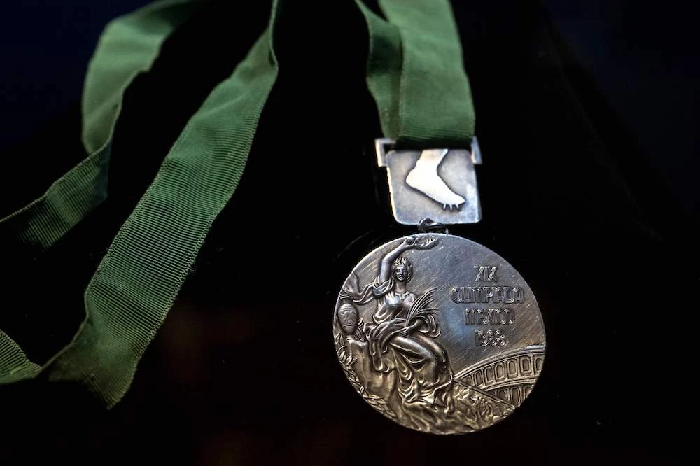 Bob Beamon’s historic leap — technically at 8.9 meters, or 29 feet and 2 1/4 inches — shattered the previous record by nearly 22 inches and earned him a gold medal at the 1968 Mexico City Summer Olympics. (AFP)