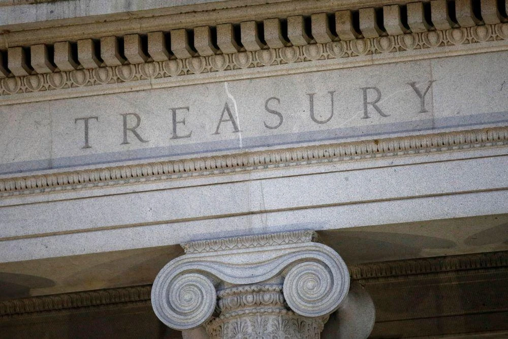 The US Treasury Department building is shown at dusk in Washington on June 6, 2019. (AP Photo)