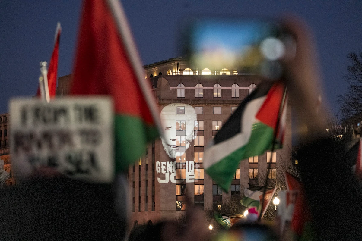 An image of US President Joe Biden is projected onto a building in the vicinity of the White House during the "March on Washington for Gaza" in Washington. (File/AFP)