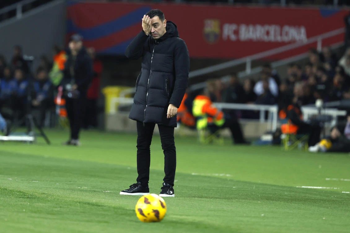 Barcelona’s head coach Xavi Hernandez reacts during their Spanish La Liga match against Osasuna at the Olimpic Lluis Companys stadium in Barcelona on Jan. 31, 2024. (AP)