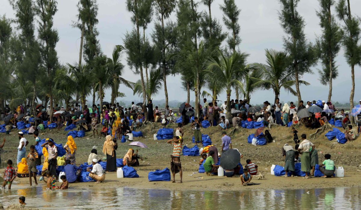Displaced Rohingya refugees from Rakhine state in Myanmar rest near Ukhia, at the border between Bangladesh and Myanmar. (AFP)
