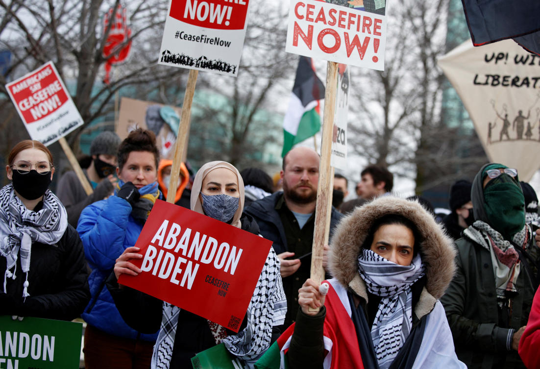 Protestors rally for a cease fire in Gaza outside a UAW union hall during a visit by U.S. President Joe Biden in Warren, Michigan.(REUTERS)