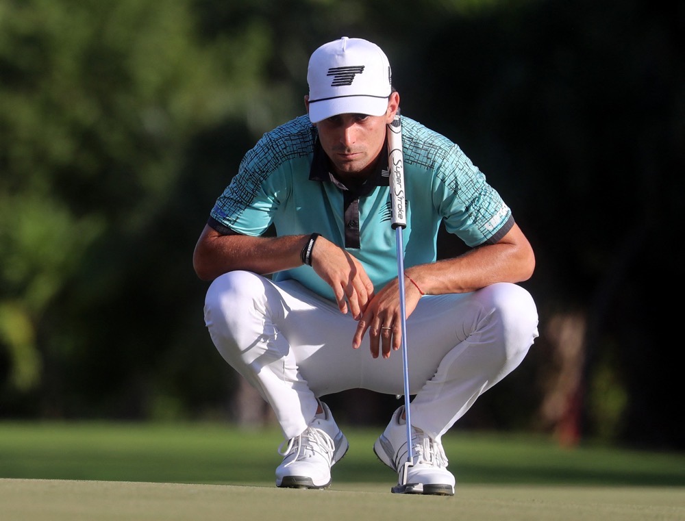 Torque GC’s Joaquin Niemann lines up his putt during the first round in the LIV Golf Mayakoba at El Camaleon Mayakoba Golf Course, Playa del Carmen, Mexico on Feb. 2, 2024. (Reuters)