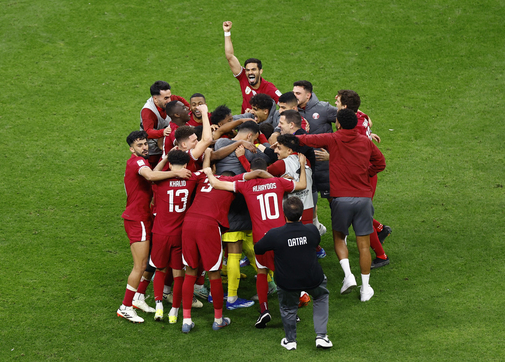 Goalkeeper saves Qatar in shootout to set up Iran semifinal at Asian Cup