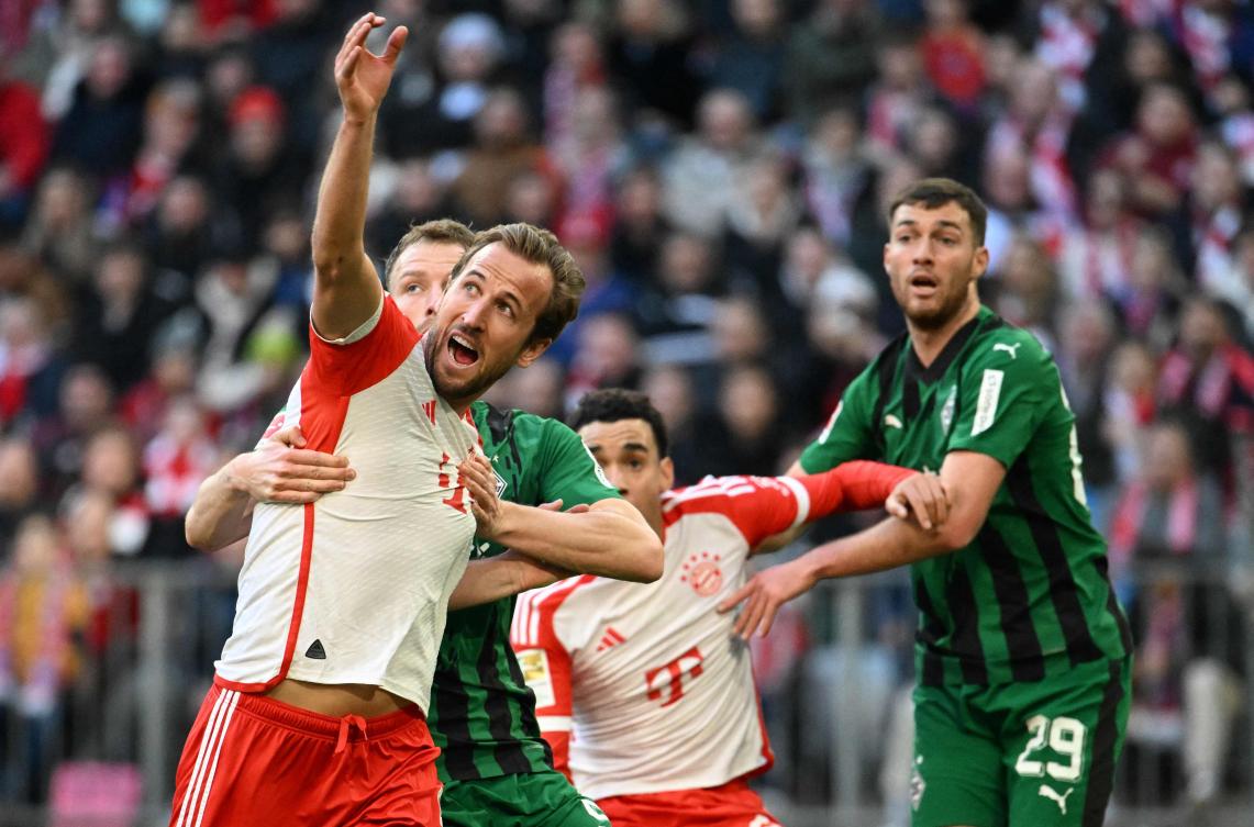 Bayern Munich's English forward Harry Kane vies for the ball during their Bundesliga match against Borussia Moenchengladbach in Munich on Feb. 3, 2024. (AFP)