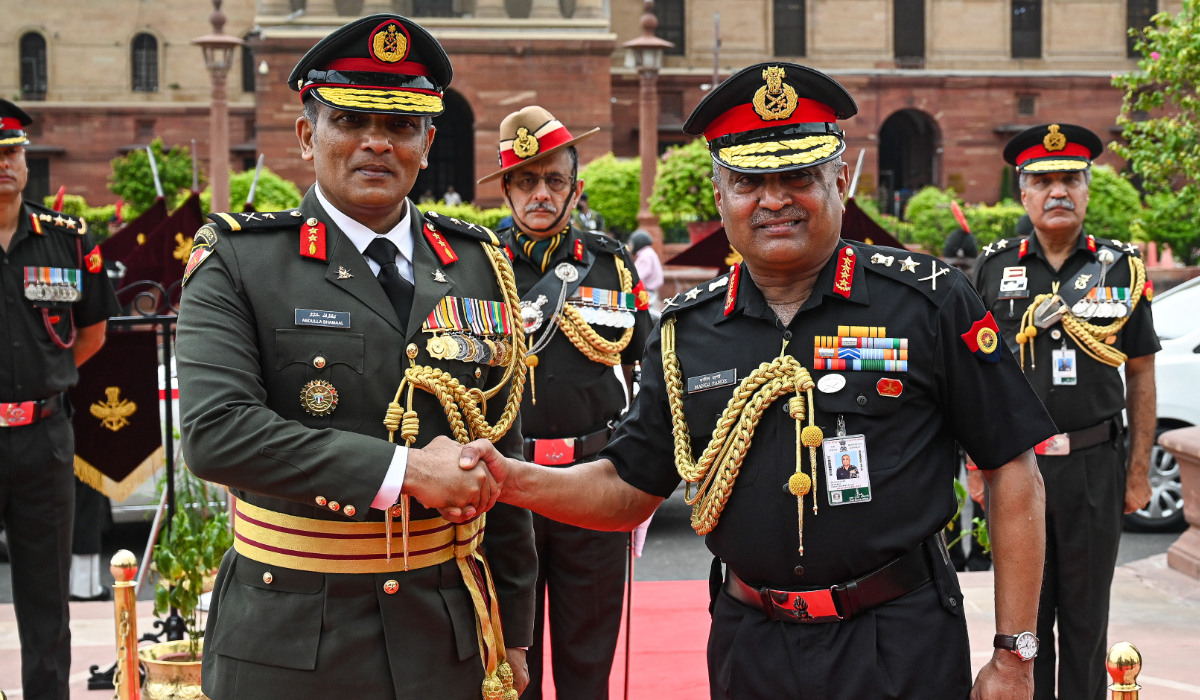 India Army Chief Manoj Pandey (R) shakes hands with Chief of Defence Force of Maldives Abdulla Shamaal during a welcome ceremony prior to a guard of honor and a meeting in New Delhi on July 28, 2022. (AFP file photo)