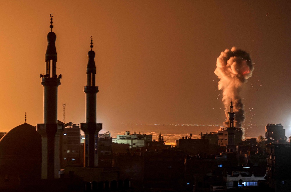 Smoke billows during Israeli bombardment in Rafah on the southern Gaza Strip amid ongoing battles between Israel and Hamas. (AFP)