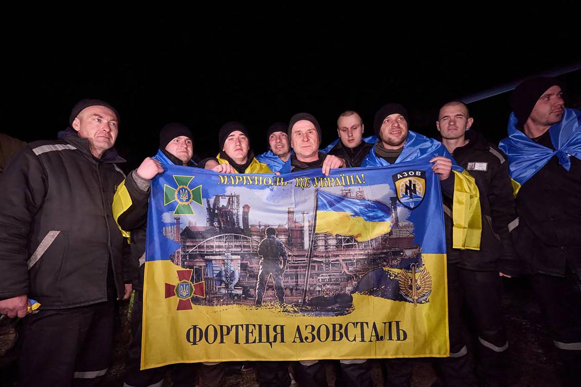 This handout photograph released by Ukrainian presidential press service on Feb. 8, 2024, shows Ukrainian prisoners of war posing for a photo following a swap at an undisclosed location in Ukraine. (AFP)