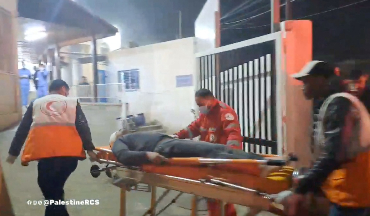 A man recovered from the rubble is transported by Palestine Red Crescent team in Rafah, Gaza, in this screen grab obtained from social media video released on February 9, 2024. (REUTERS)