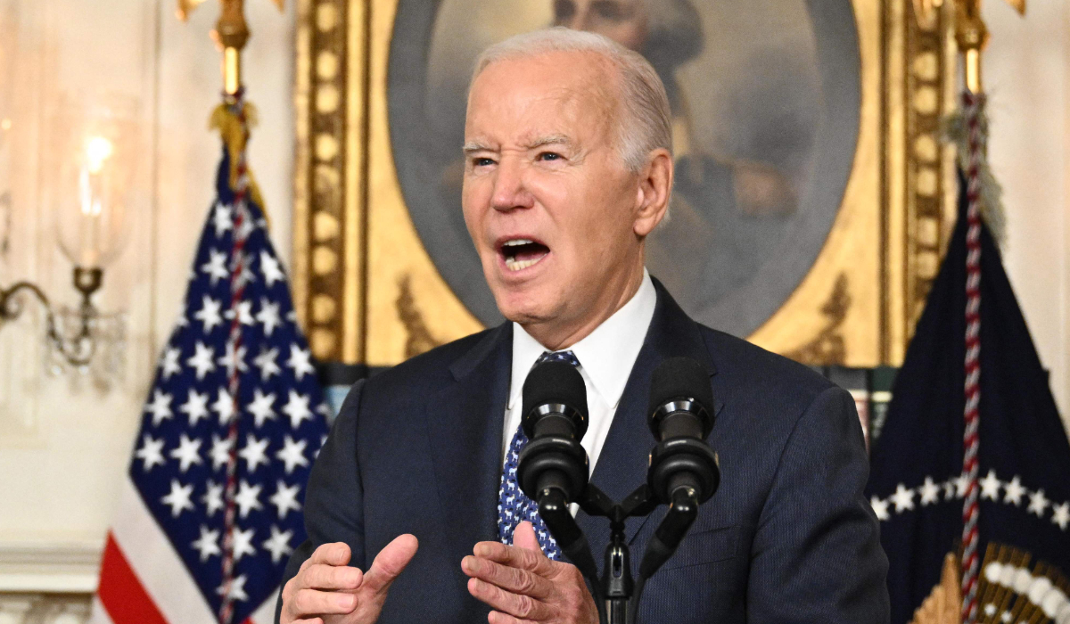 US President Joe Biden answers questions about Israel after speaking about the Special Counsel report in the Diplomatic Reception Room of the White House in Washington, DC, on February 8, 2024 in a surprise last-minute addition to his schedule for the day. (AFP)