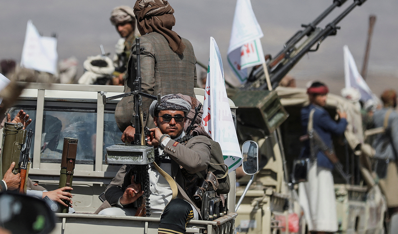 Houthi tribesmen gather to show defiance after U.S. and UK air strikes on Houthi positions near Sanaa, Yemen February 4, 2024. (Reuters)