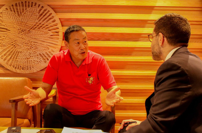 Prime Minister Srettha Thavisin (L) speaks with Arab News Editor-in-Chief Faisal J. Abbas in Bangkok’s Chinatown on February 10, 2024. (AN photo by Abdulrahman Fahad bin Shulhub)
