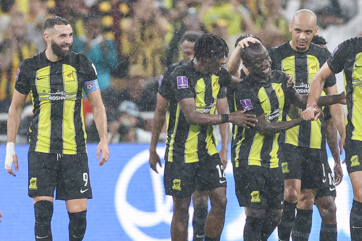 Ittihad's French forward #09 Karim Benzema (L) and Ittihad's French midfielder #07 N'Golo Kante (2R) celebrate after a goal during the FIFA Club World Cup first round football match (AFP)