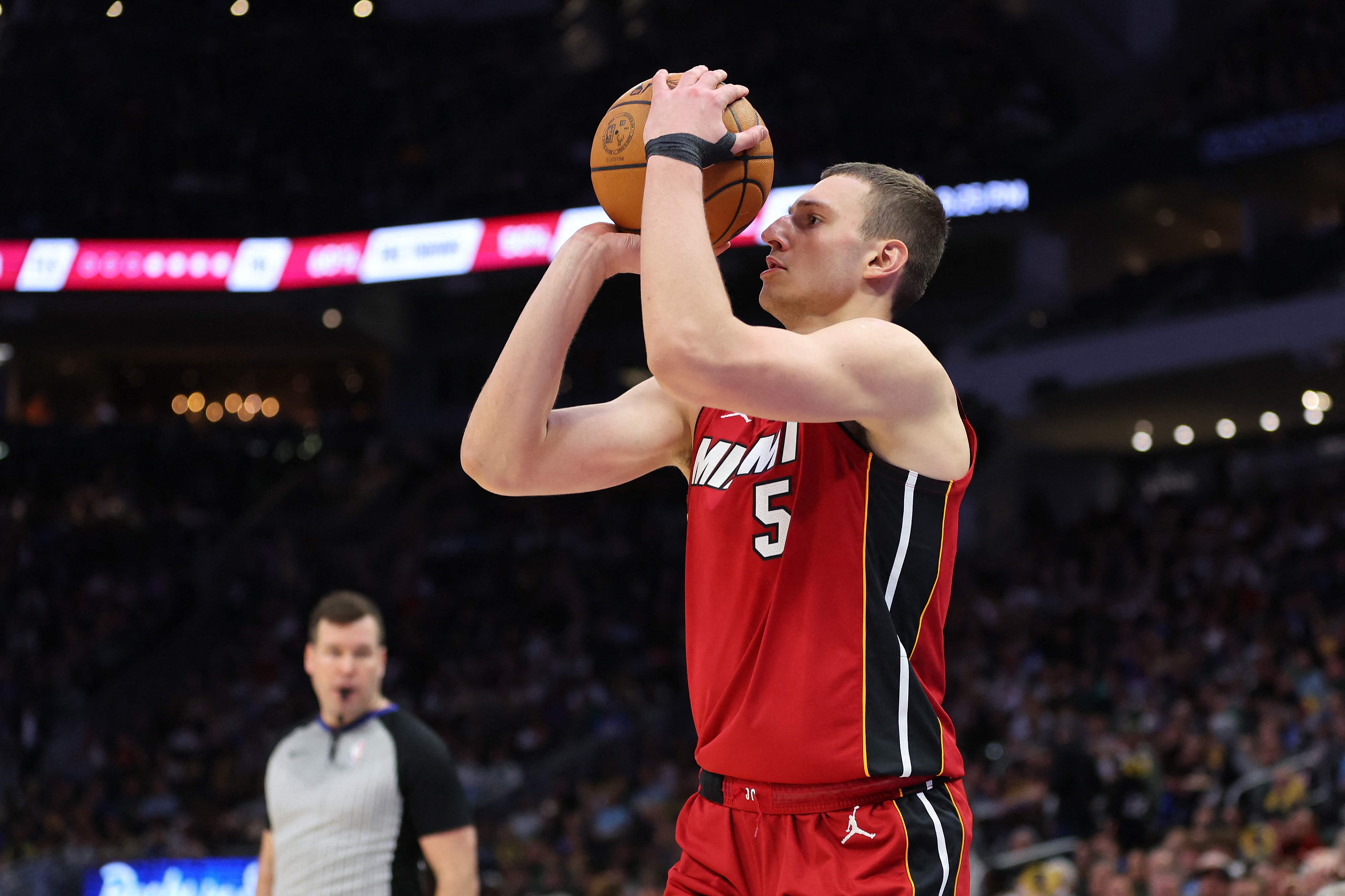 Nikola Jovic of the Miami Heat takes a three point shot during the second half of a game against the Milwaukee Bucks at Fiserv Forum on Feb. 13, 2024 in Milwaukee, Wisconsin. (GETTY IMAGES NORTH AMERICA / AFP)