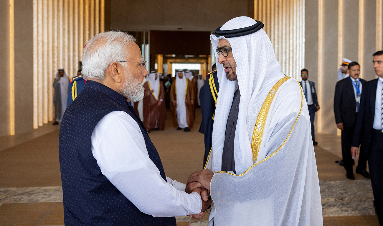 Sheikh Mohamed bin Zayed Al Nahyan, President of the United Arab Emirates, shakes hand with Narendra Modi, Prime Minister of India, to bid farewell after a reception at the Presidential Airport, in Abu Dhabi, United Arab Emirates, February 13, 2024. (Photo courtesy: UAE Presidential Court via REUTERS)