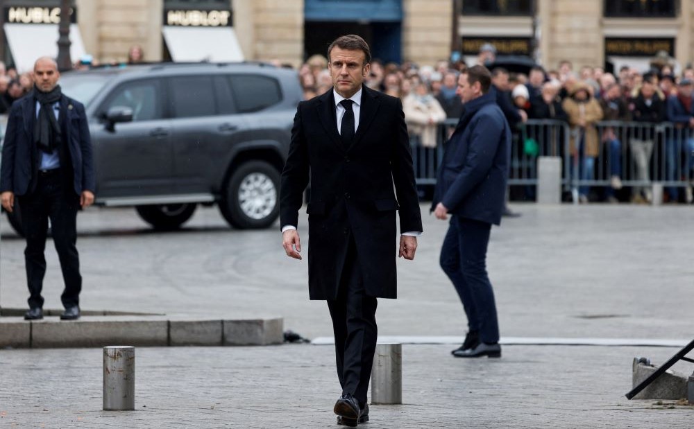 Emmanuel Macron attends a national tribute ceremony in honor of late former French Justice Minister Robert Badinter, Ministry of Justice, Place Vendome, Paris, France, Feb. 14, 2024. (Reuters)