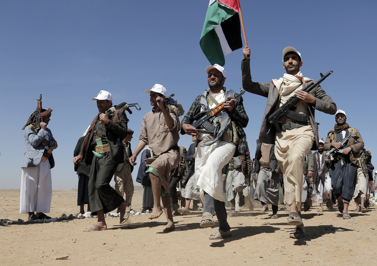 Houthi fighters march during a rally of support for the Palestinians in the Gaza Strip and against the US strikes on Yemen outside Sanaa on Jan. 22, 2024. (AP/File)