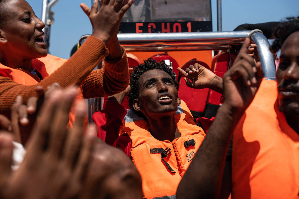 Picture shows some of the 266 migrants rescued by the NGO Proactiva Open Arms when they were crossing the Mediterranean sea on little boats off the Libyan coast. (File/AFP)
