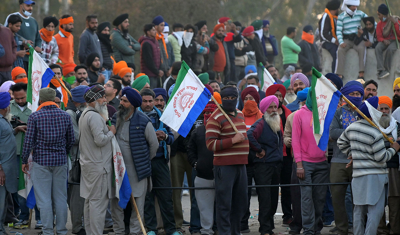 Farmers gather during a protest march to India's capital New Delhi to demand minimum crop prices, near the Haryana-Punjab state border at Shambhu in Patiala district on February 15, 2024. (AFP)