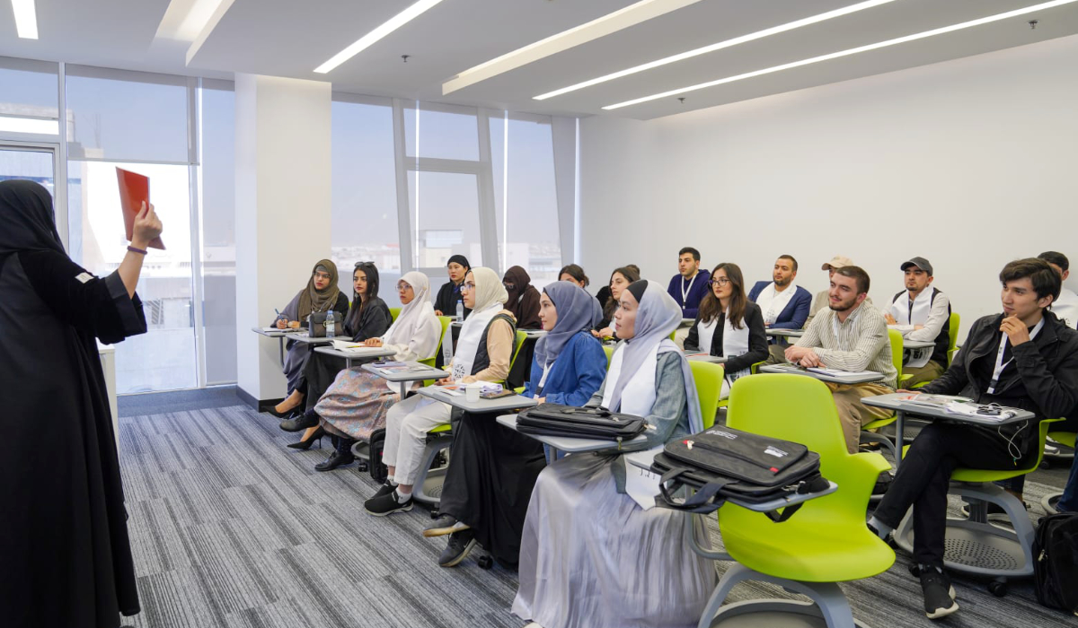 A female teaching member teaching Arabic to speakers of other languages at ABJAD Center's Arabic language program. (Supplied)