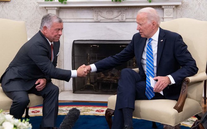 US President Joe Biden and Jordan's King Abdullah II shake hands during a meeting in the Oval Office. (File/AFP)