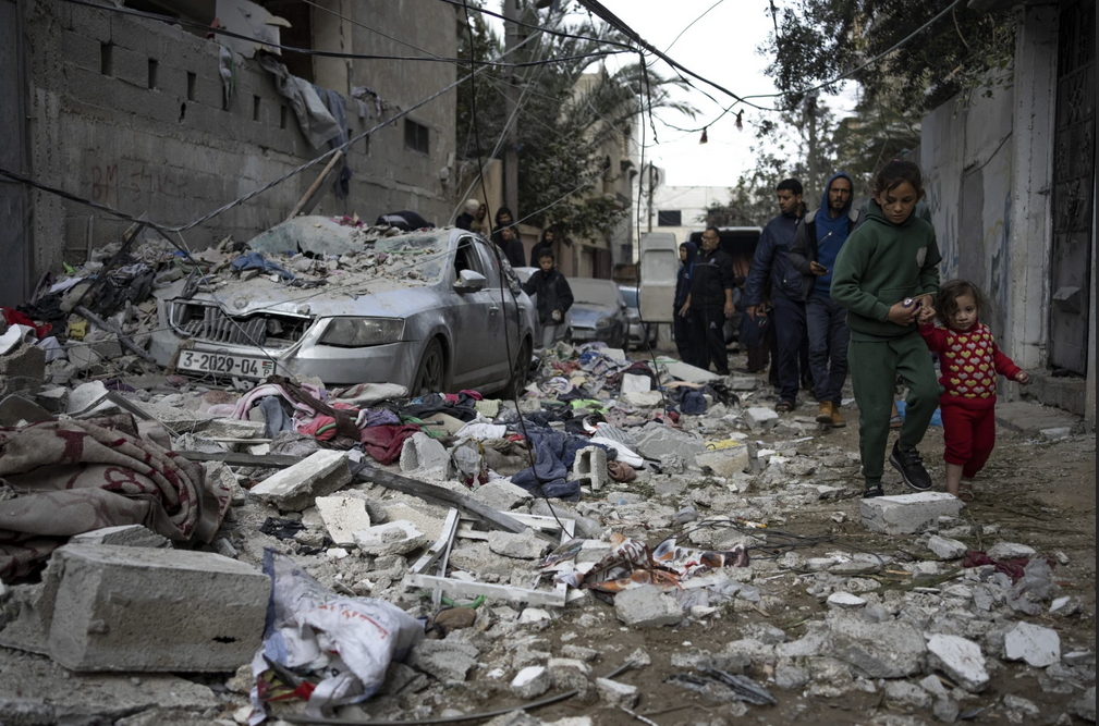 Palestinians look at the destruction after an Israeli airstrike in Rafah, Gaza Strip on Feb. 9, 2024. (AP)