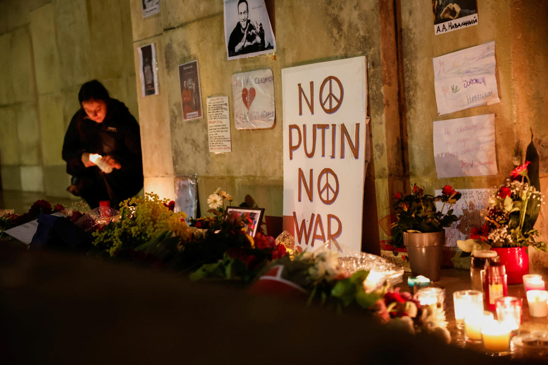 People attend a vigil following the death of Russian opposition leader Alexei Navalny, at the Trocadero near the Eiffel Tower in Paris, France, February 19, 2024. (Reuters)