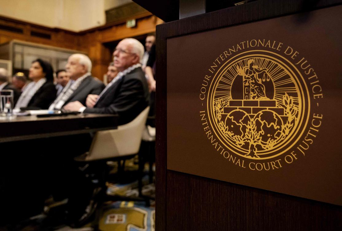 Above, Minister of Foreign Affairs of the Palestinian Authority Riyad Al-Maliki, right, and members of his delegation attend the International Court of Justice hearing in The Hague on Febru. 19, 2024. (ANP/AFP)