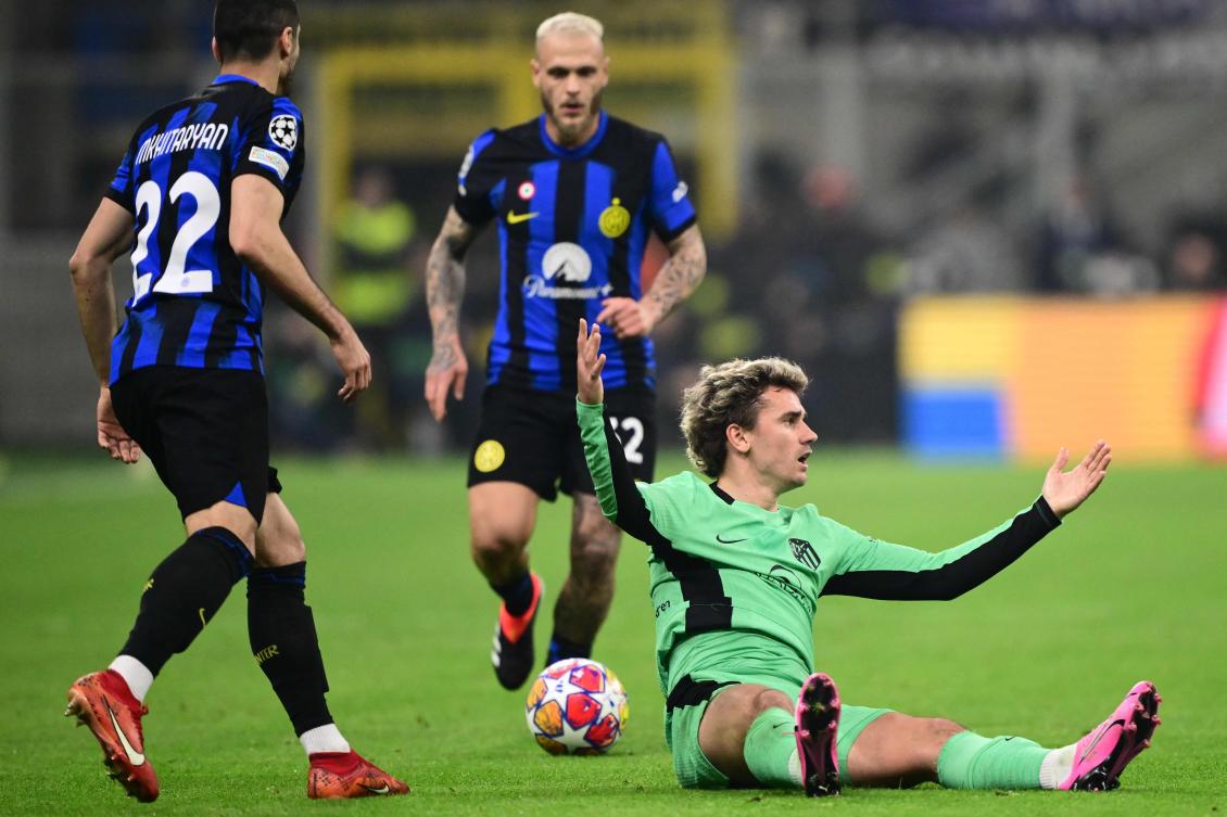 Atletico Madrid’s French forward Antoine Griezmann reacts during their UEFA Champions League last 16 first leg match against Inter Milan at the San Siro stadium in Milan on Feb. 20, 2024. (AFP)