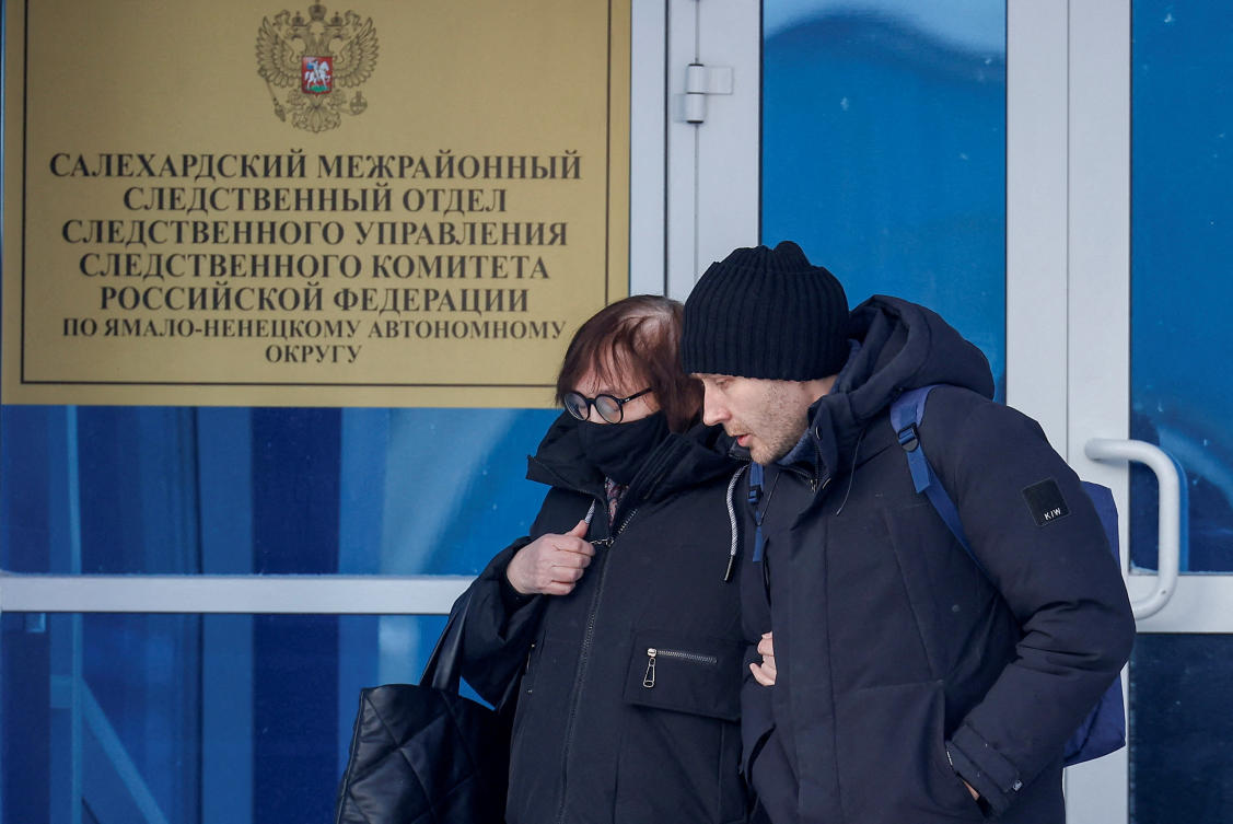 Russian opposition leader Alexei Navalny’s mother Lyudmila Navalnaya and his lawyer Alexei Tsvetkov walk out of an office of the Investigative Committee’s regional department in the city of Salekhard, Russia, on Feb. 19, 2024. (Reuters)