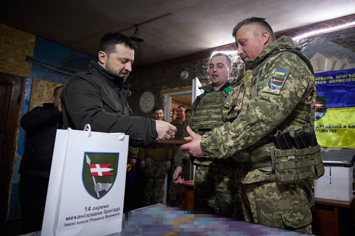 Ukrainian President Volodymyr Zelensky (L) visits the frontline positions of Ukrainian troops in the Kupyansk sector on Feb. 19, 2024, amid the Russian invasion of Ukraine. (Ukrainian Presidential Press Service / Handout via AFP)