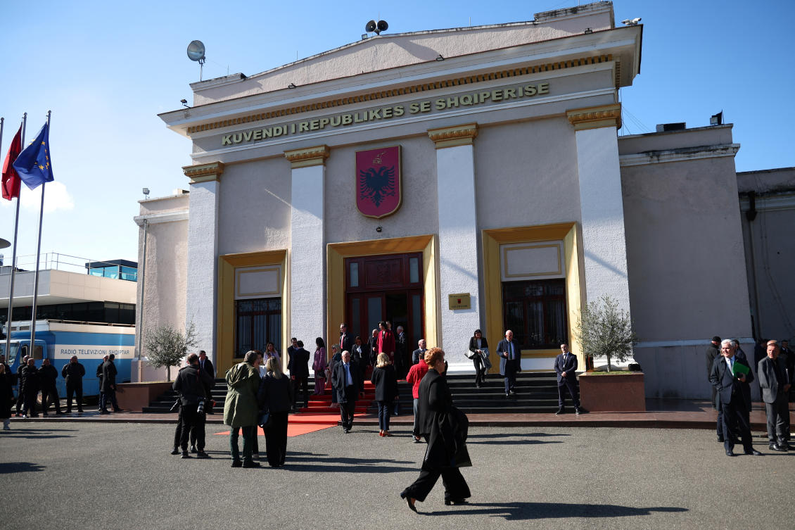 Members of the Albanian parliament after the vote on the deal between Italy and Albania that allows Italy to build migrant processing centers on Albanian territory, Tirana, Albania, Feb. 22, 2024. (Reuters)