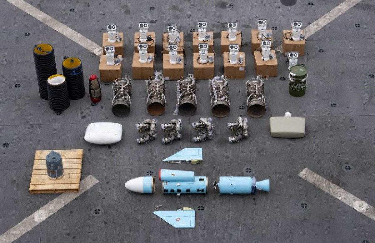 This undated photograph released by the US military's Central Command and obtained on January 18, 2024, shows what it is described as Iranian-made missile components bound for Yemen's Houthi seized off a vessel in the Arabian Sea. (AFP)
