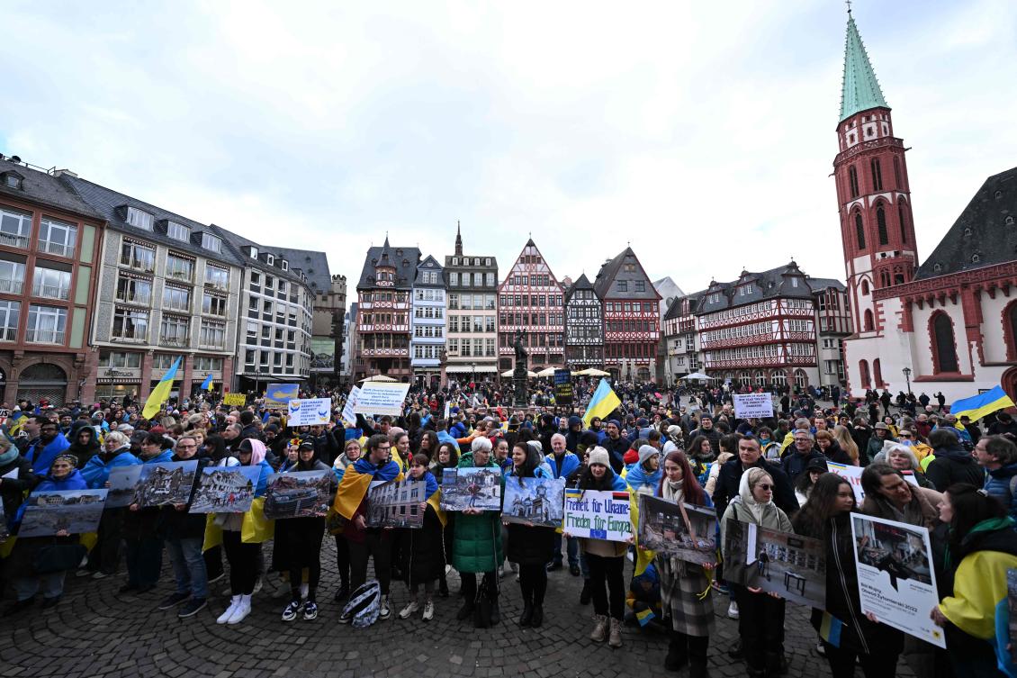 Demonstrators take part in a rally in support of Ukraine, to mark the second year of Russia’s military invasion on Ukraine, in Frankfurt on Feb. 24, 2024. (AFP)
