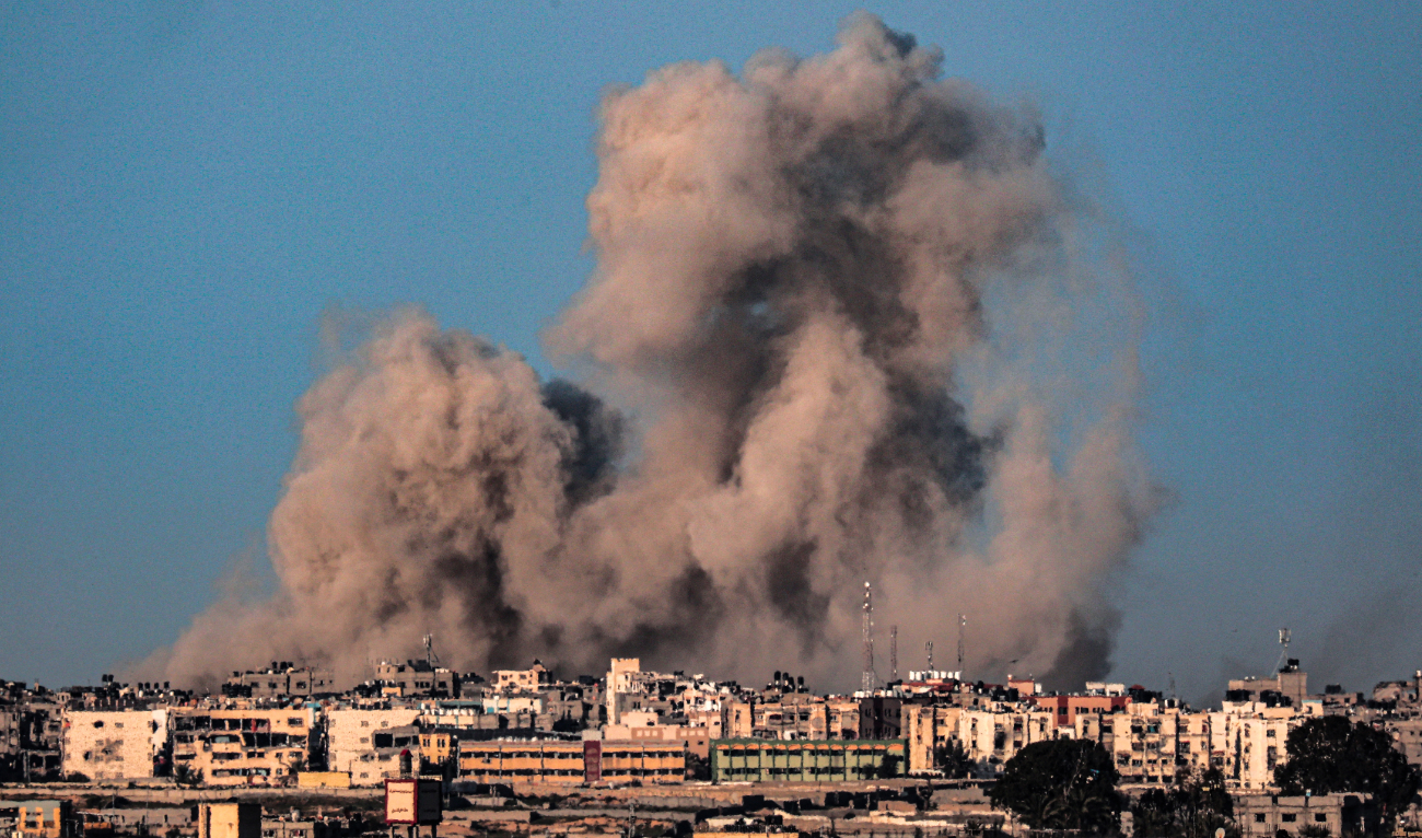 This picture taken from Rafah in the southern Gaza Strip shows smoke billowing during Israeli bombardment on Khan Yunis on February 22, 2024. (AFP/File)