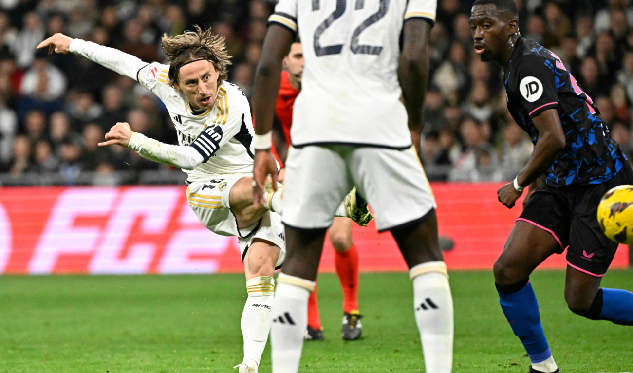 Real Madrid's Croatian midfielder Luka Modric scores his team's goal during the Spanish league football match between Real Madrid CF and Sevilla FC at the Santiago Bernabeu stadium in Madrid on Feb. 25, 2024. (AFP)