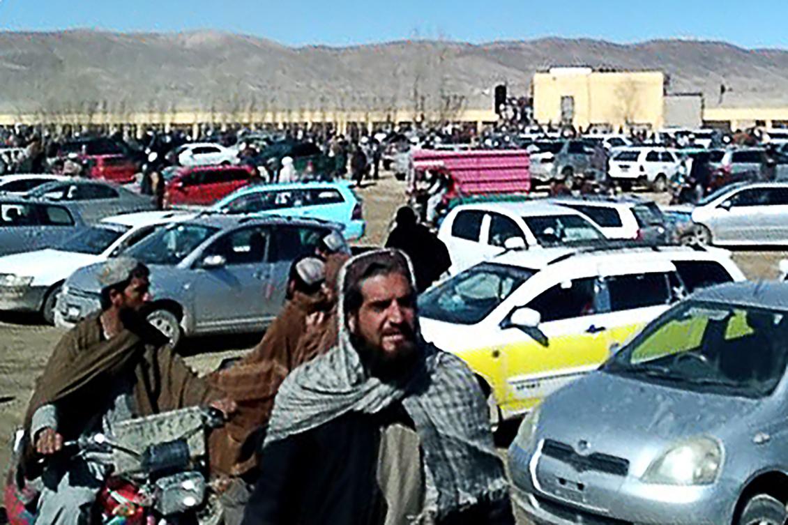 This screen grab from a video taken on January 22, 2024, shows Afghan men leaving a football stadium after attending the public execution by Taliban authorities of two men convicted of murder, in Ghazni. (FILE/AFP)