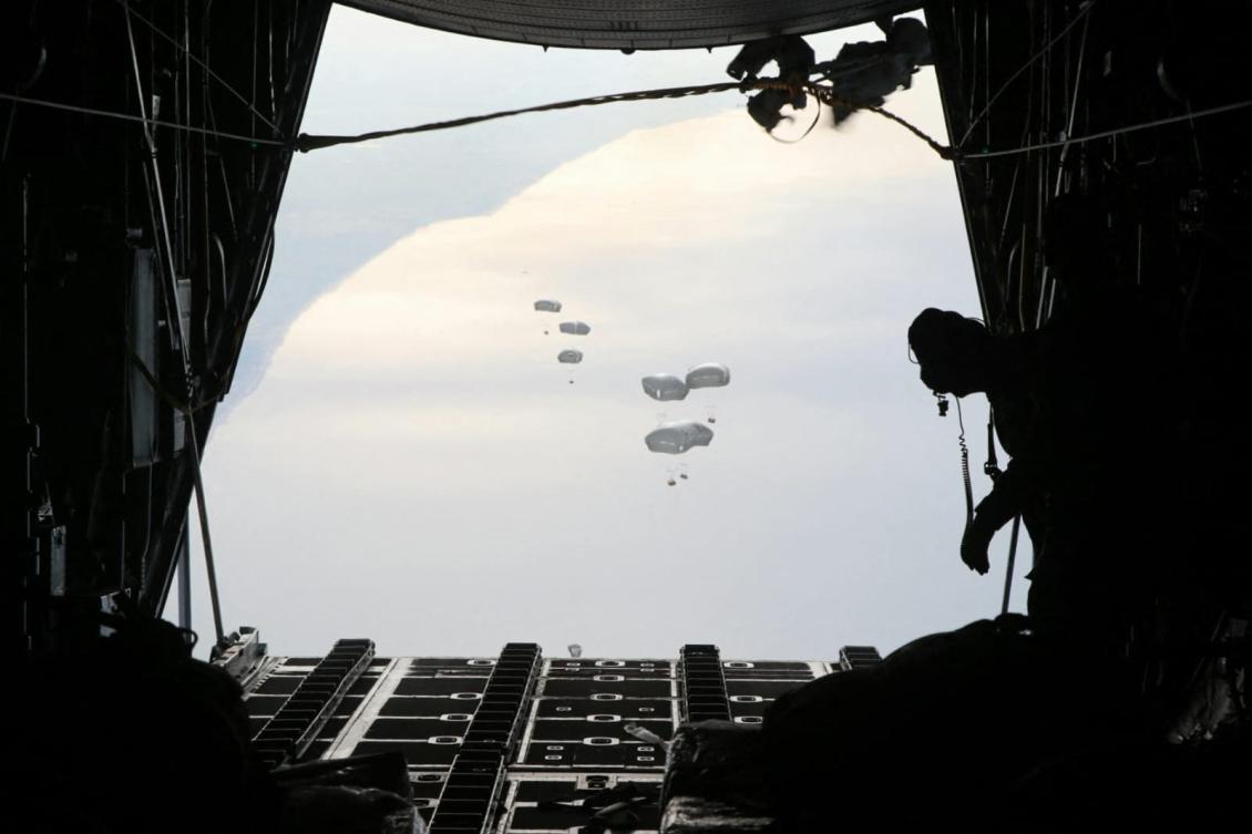 A Jordanian military aircraft drops humanitarian aid over the southern Gaza Strip, amid the ongoing conflict between Israel and Hamas. (AFP)