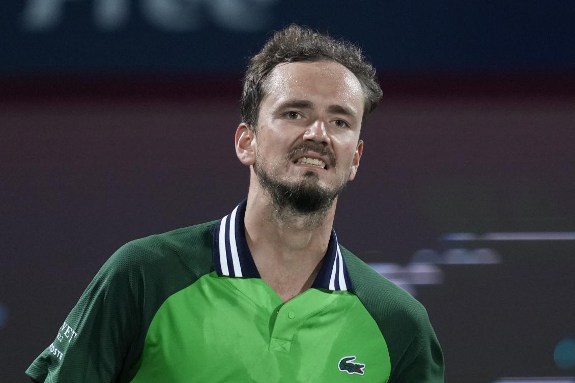 Daniil Medvedev celebrates after beating Alexander Shevchenko of Kazakhstan during a match of the Dubai Duty Free Tennis Championships in Dubai on Feb. 27, 2024. (AP)