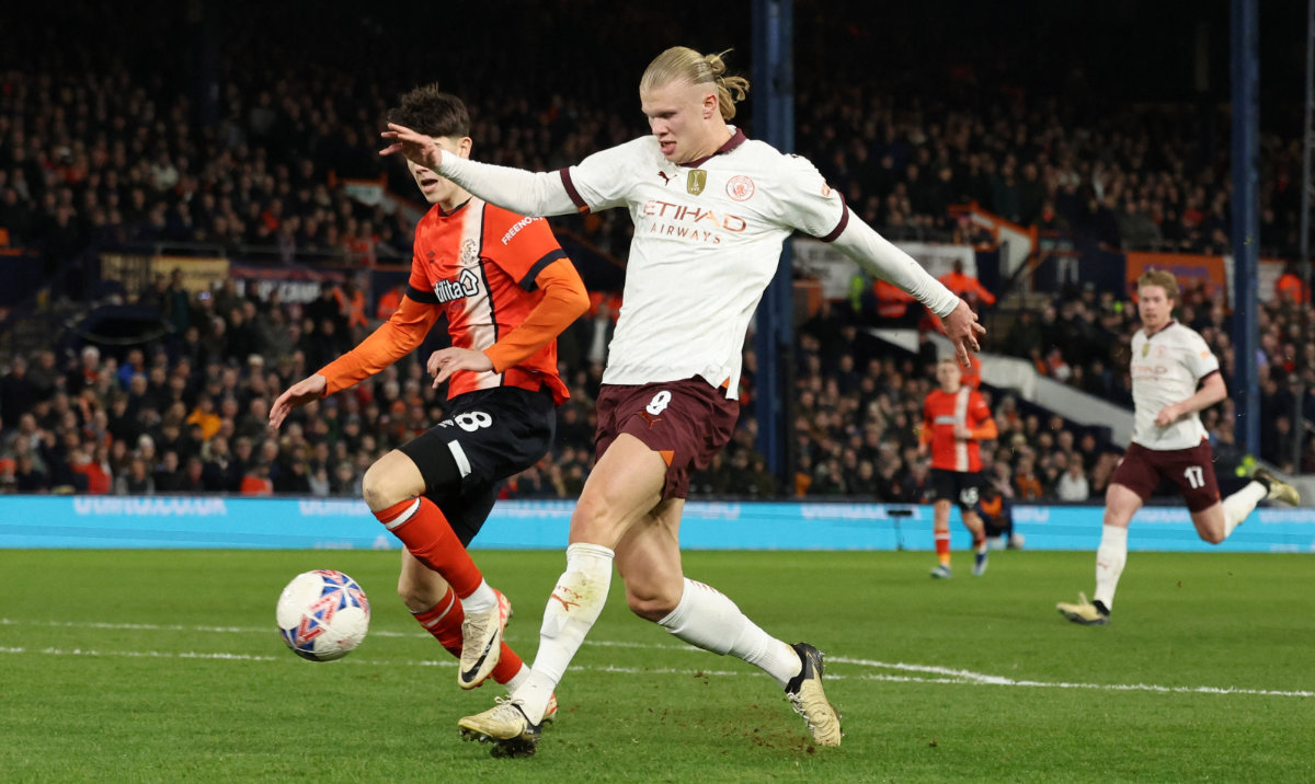 Manchester City's Erling Braut Haaland scores their third goal and completes his hat-trick against Luton Town on February 27, 2024. (Reuters)