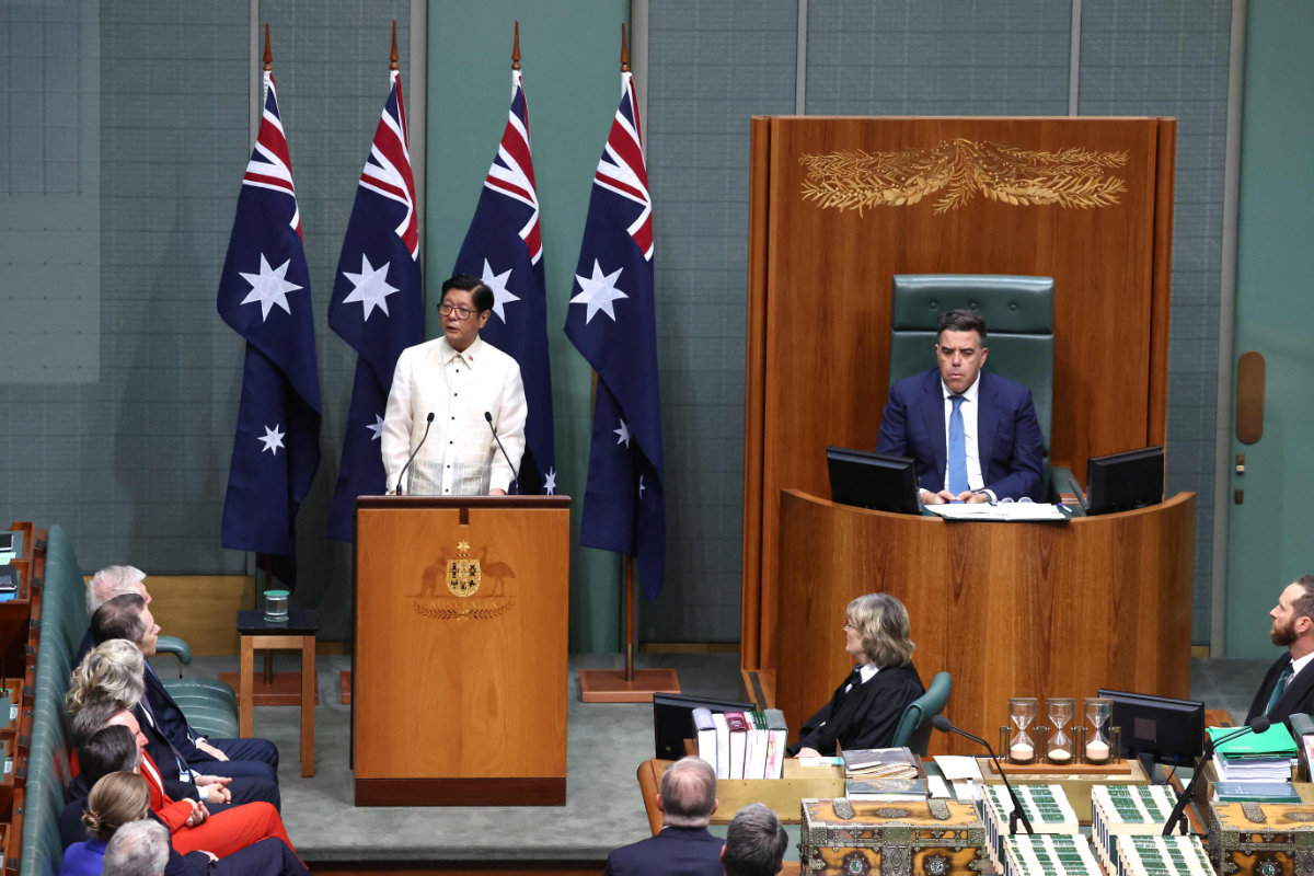 Australia’s Prime Minister Anthony Albanese (R) listens to Philippines’ President Ferdinand Marcos Jr. speak at the House of Representatives at the Parliament House in Canberra on February 29, 2024. (AFP)