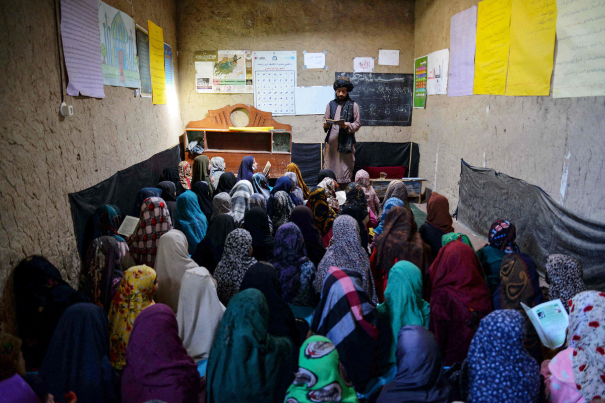 Afghan girls attend a class at an Islamic school in Kandahar on Feb. 20, 2024. (AFP)