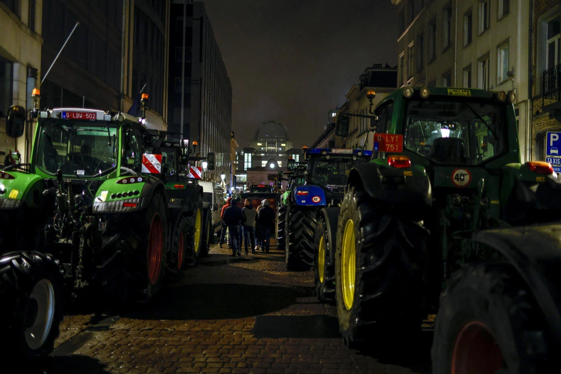 Tractors are parked as farmers gather for a protest outside the European Parliament ahead of an EU summit in Brussels on Feb. 1, 2024. (AP)