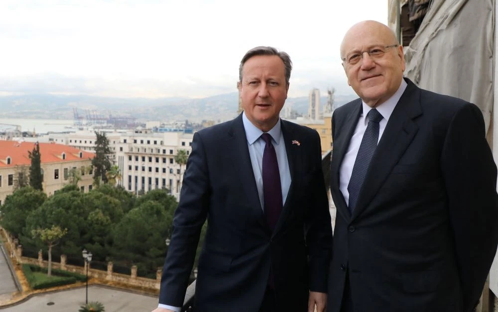 Lebanon’s Prime Minister Najib Mikati, right, with Britain’s Foreign Secretary David Cameron before a meeting at Government Palace in Beirut, Feb. 1, 2024. (AFP)