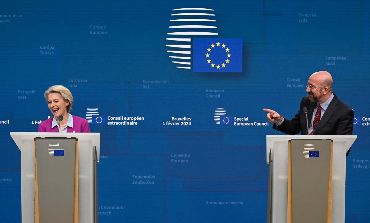 European Commission President Ursula von der Leyen (L) and European Council President Charles Michel (R) react during a press conference as part of a European Council meeting at the European headquarters in Brussels, on February 1, 2024. (AFP)