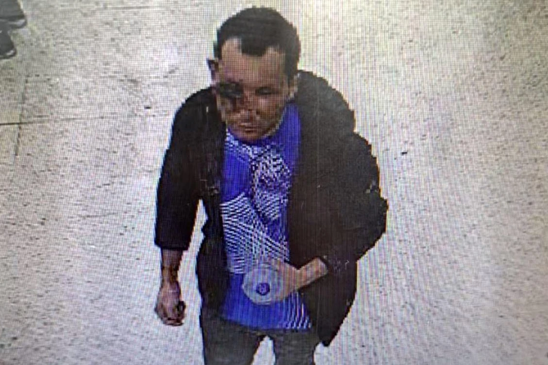 A handout CCTV grab released by Britain's Metropolitan Police in London on February 1, 2024 shows Abdul Shokoor Ezedi, taken in a Tesco store in north London late on January 31, 2024, which appears to show severe damage to his face.(AFP)