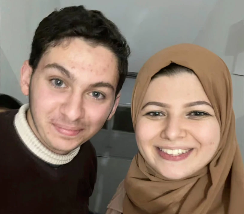 Torak Alagha, one of the two American brothers detainmed by Israelis in Gaza, is shown with cousin Yasmeen Elagha in this undated image. (Yasmeen Elagha via AP)