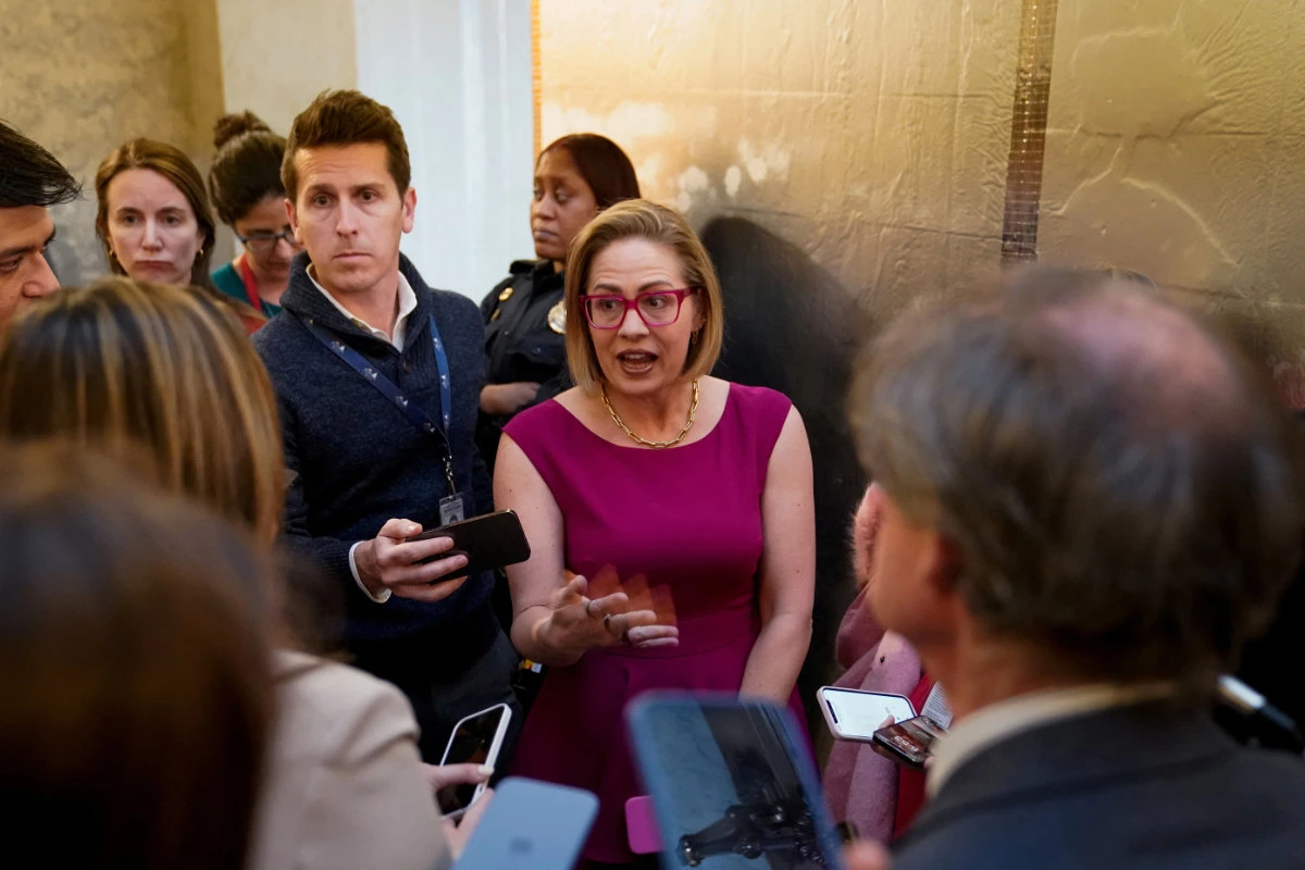 US Senator Kyrsten Sinema speaks to reporters about a bill on border security and aid to Ukraine and Israel. (REUTERS)