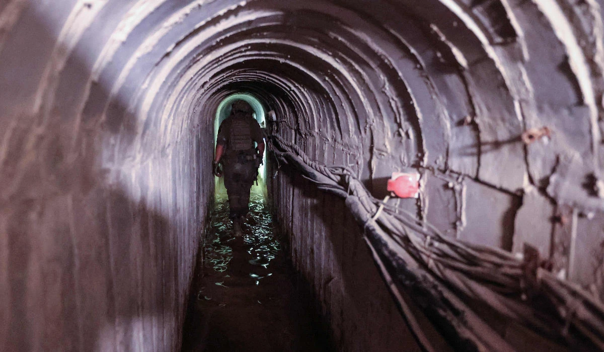 Israeli soldiers inside a tunnel that the army claimed is a "Hamas command tunnel" under a compound of the United Nations Relief and Works Agency for Palestine Refugees (UNRWA) in Gaza City, amid the continuing war between Israel and the Palestinian militant group. (AFP)