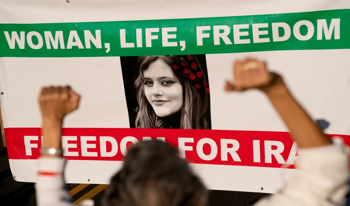 Demonstrators chant slogans while marching during the "March of Solidarity for Iran" in Washington, DC, on October 15, 2022. (AFP/File)